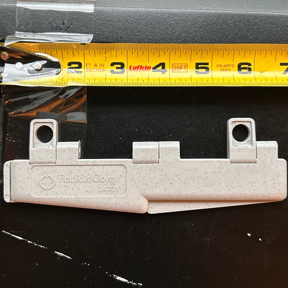 Franklin Covey portable size 6-hold punch